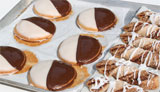 Danishes and pastries on a bakery tray