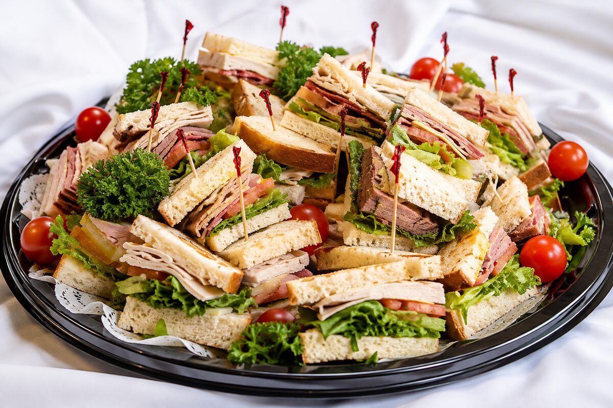 Classic deli sandwich tray with turkey, roast beef and pastrami halves
