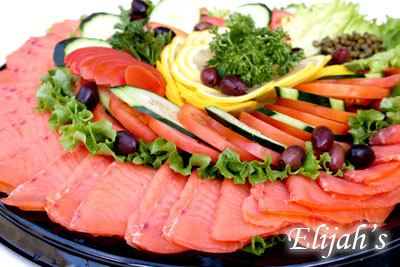 Lox and bagel platter with cream cheese and garnish